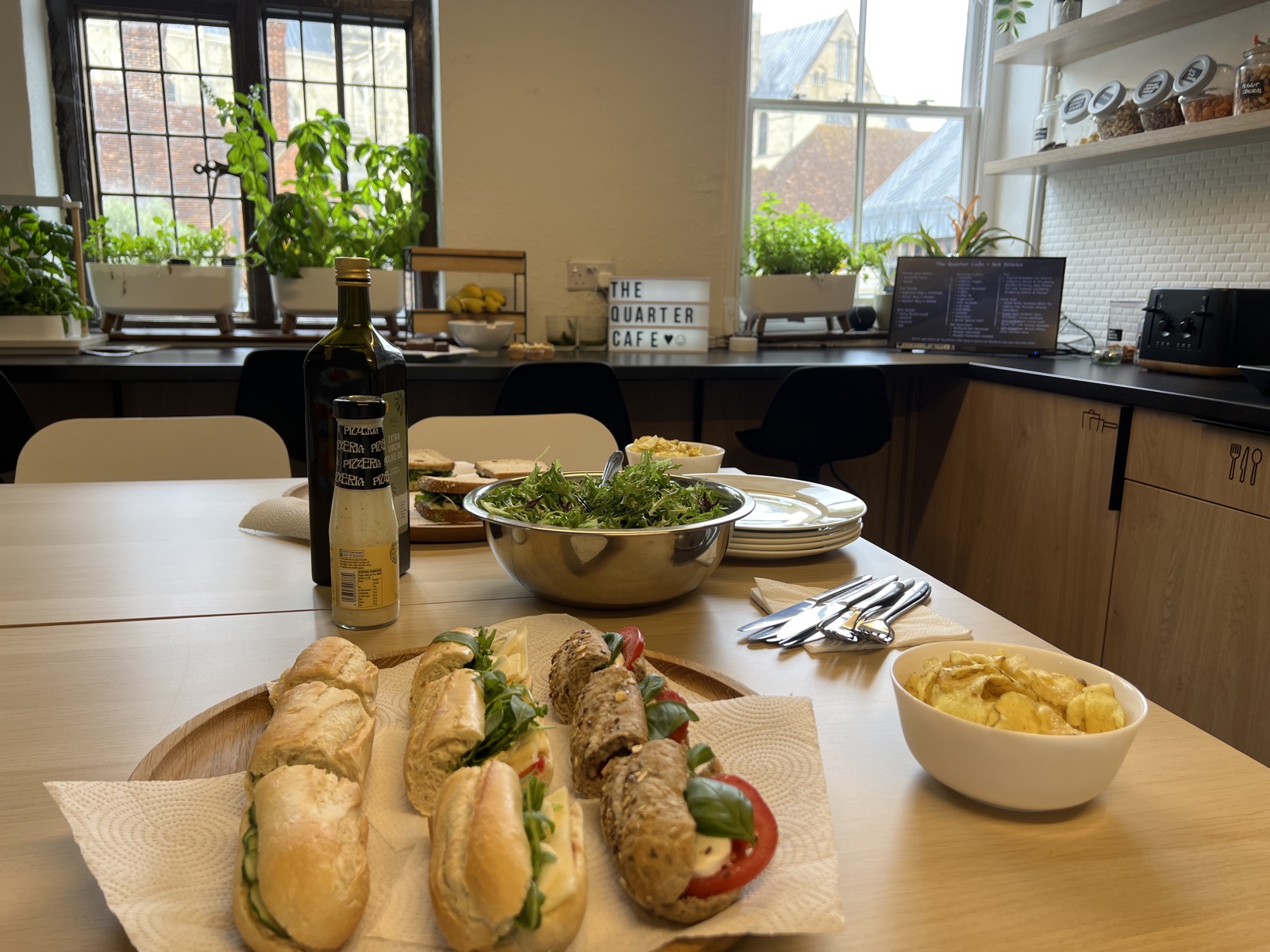 Fresh baguettes and salad from The Sandwich Bar, laid out for a meeting